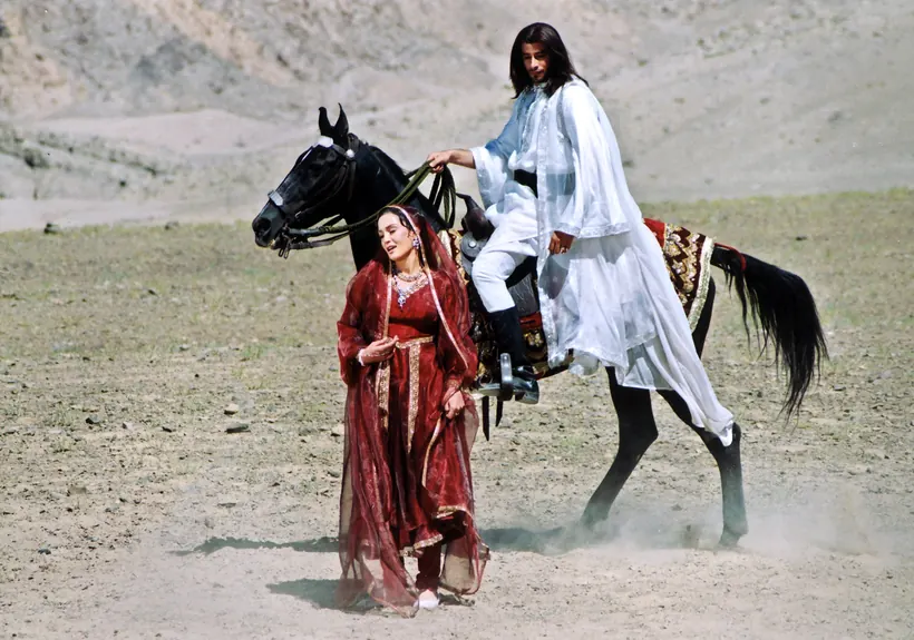 Character and horse film still from Taj Mahal… An Eternal Love Story